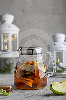 fruit tea in a teapot on the table