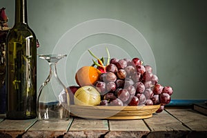 Fruit tray and a glass