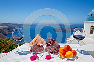 Fruit and two glasses of red wine