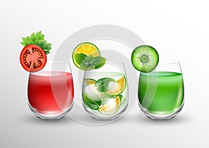Fruit and vegetable juice in glasses and pieces of fresh fruits over glass