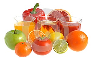 Fruit and vegetable mix with three glasses filled with juice iso