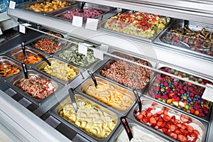 Fruit and vegetable salads for sale photo