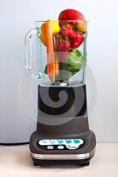 Fruit and vegetables in a food blender