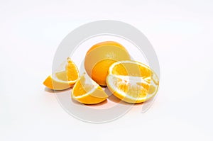 Fruit on a white background - orange, pomegranate, lemon