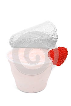 Fruit yogurt in plastic container on white