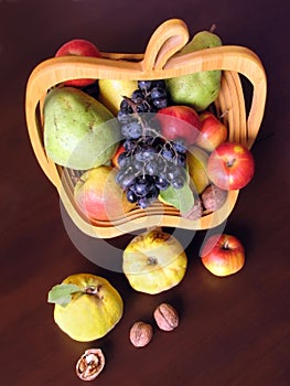 Fruits in apple shaped basket