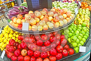 Fruits apples lemons in super market