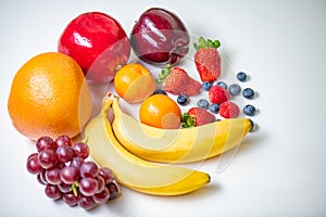 Fruits arrangement on white table