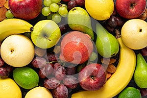 fruits background red, green and yellow color composition. Summer abstract creative trendy fresh health concept. Flat lay top view