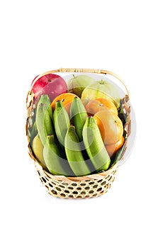 Fruits basket assorted wicker on white background fruit health food isolated