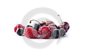 Fruits and berries isolated on white background. Ripe currants, raspberries, cherries, strawberries. Background of mix fruits with