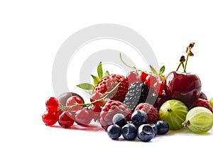 Fruits and berries isolated on white background. Ripe currants, raspberries, cherries, strawberries, gooseberries, mulberries and