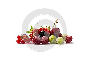 Fruits and berries isolated on white background. Ripe currants, raspberries, cherries, strawberries, gooseberries, mulberries. Bac