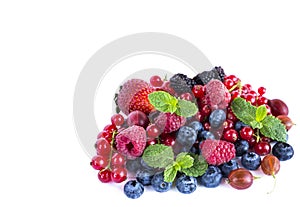 Fruits and berries isolated on white background. Ripe red currants, raspberries, blueberries, strawberries, gooseberrie, blackber