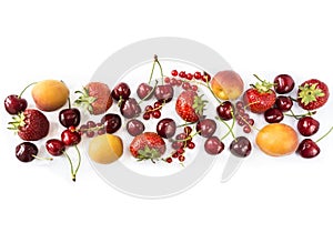 Fruits and berries isolated on white background. Sweet and juicy fruits at border of image with copy space for text. Ripe apricots