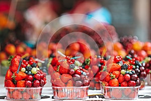 Fruits and berries on the street market.