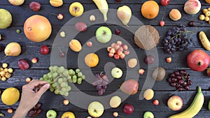 Fruits on black ecological background. Top view.