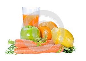 Fruits and carrot with glass of fresh juice