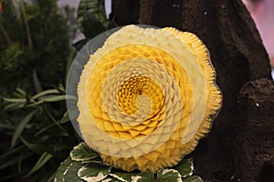 Fruits are carved into beautiful flower shapes.