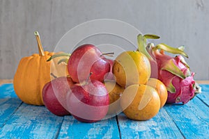 Fruits diet concept. different fruits on wooden table