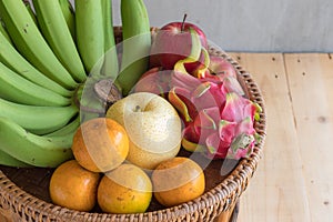 Fruits diet concept. different fruits on wooden table