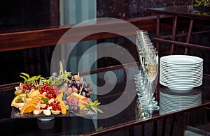 Fruits and drinks served on table