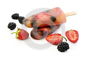 Fruits ice lolly with fresh berries