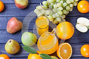 Fruits and juice in the jug top view