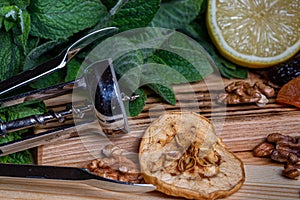 Fruits and kitchen herbs still life in the kitchen