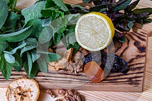 Fruits and kitchen herbs still life in the kitchen