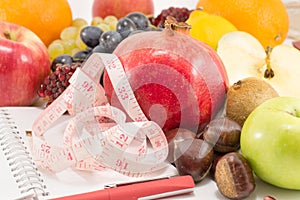 Fruits notebook and a tape measure