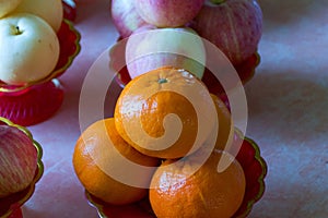 Fruits on the pedestal tray.