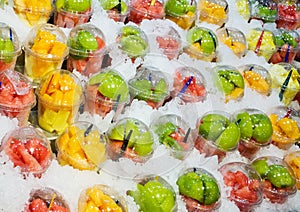 Fruits in plastic caps