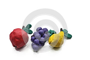 Fruits from plasticine. photo