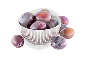 Fruits plums ina bowl isolated