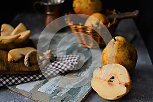 fruits on the retro table, quince in the basket