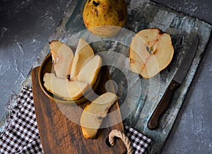 fruits on the retro table, quince in the basket