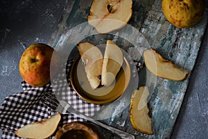 fruits on the retro table, quince in the basket