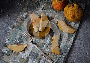 fruits on the retro table, quince in the basket