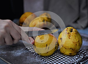 fruits on the retro table, quince in the basket