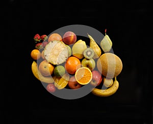 Fruits,several types of fruit on a black background