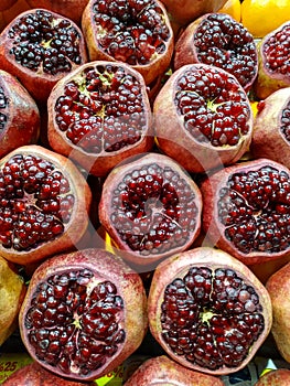 Red fruits sliced in half. Turkish fruit market. Fresh juice