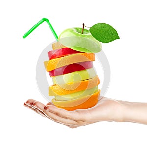 Fruits stack. Hand holding mixed fruit on white