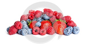 Fruits. Sweet berries on white background. Fresh ripe fruits closeup. Strawberry, raspberry and blueberry