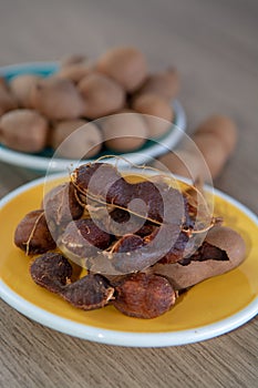 Fruits of tropcal Africal tree tamarind, used in cooking, traditional medicine and metal polish photo