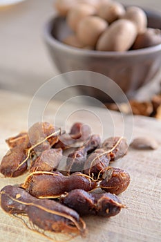 Fruits of tropcal Africal tree tamarind, used in cooking, traditional medicine and metal polish photo