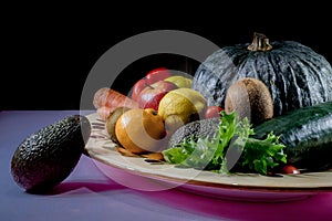 Fruits and vegetables in basket with background