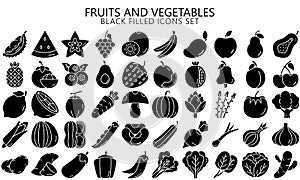 Fruits and vegetables black filled icons set