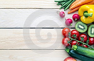 Fruits and vegetables. On a black wooden background. View from above. Copy space