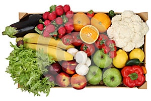 Fruits and vegetables in box from above isolated